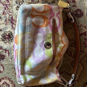 Coach Mini Purse in wonderful used condition. See photos for details.